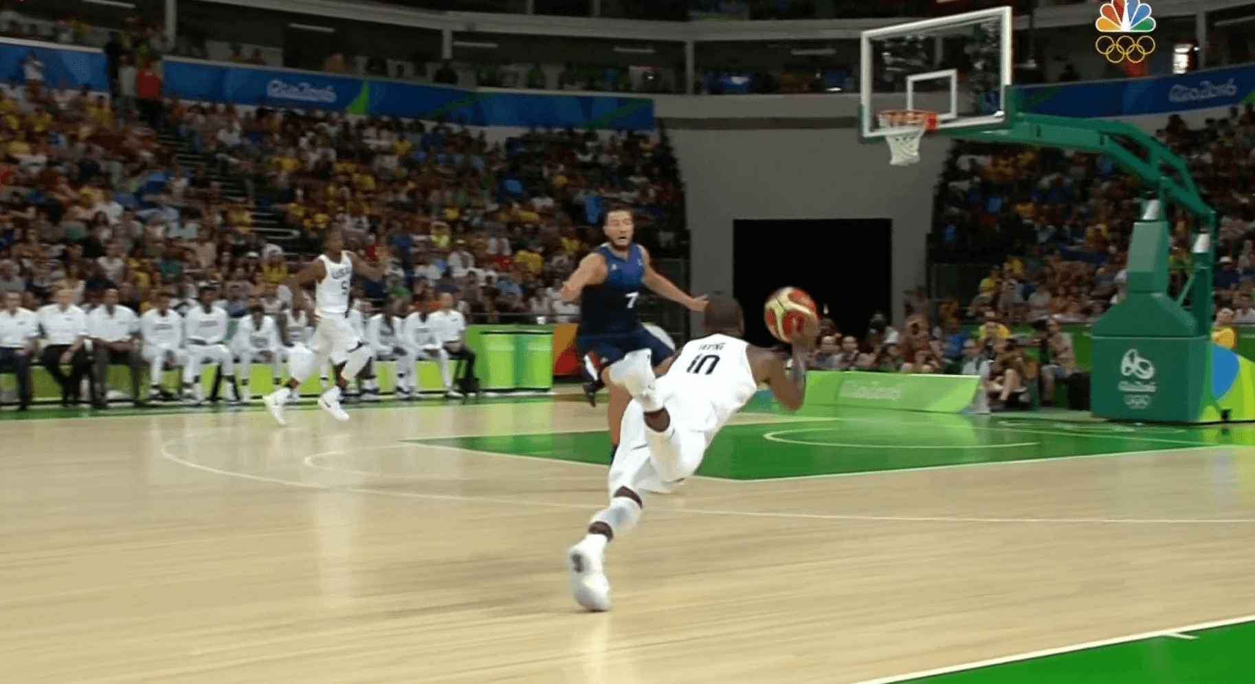 Video: Kyrie Irving throws perfect half-court alley-oop to Kevin Durant while falling down