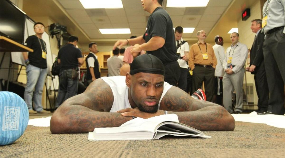 LeBron reads book