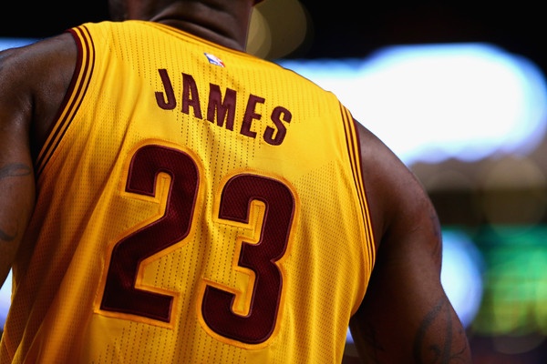 SEE IT: Cavaliers 'fan' wears burnt LeBron James jersey to game