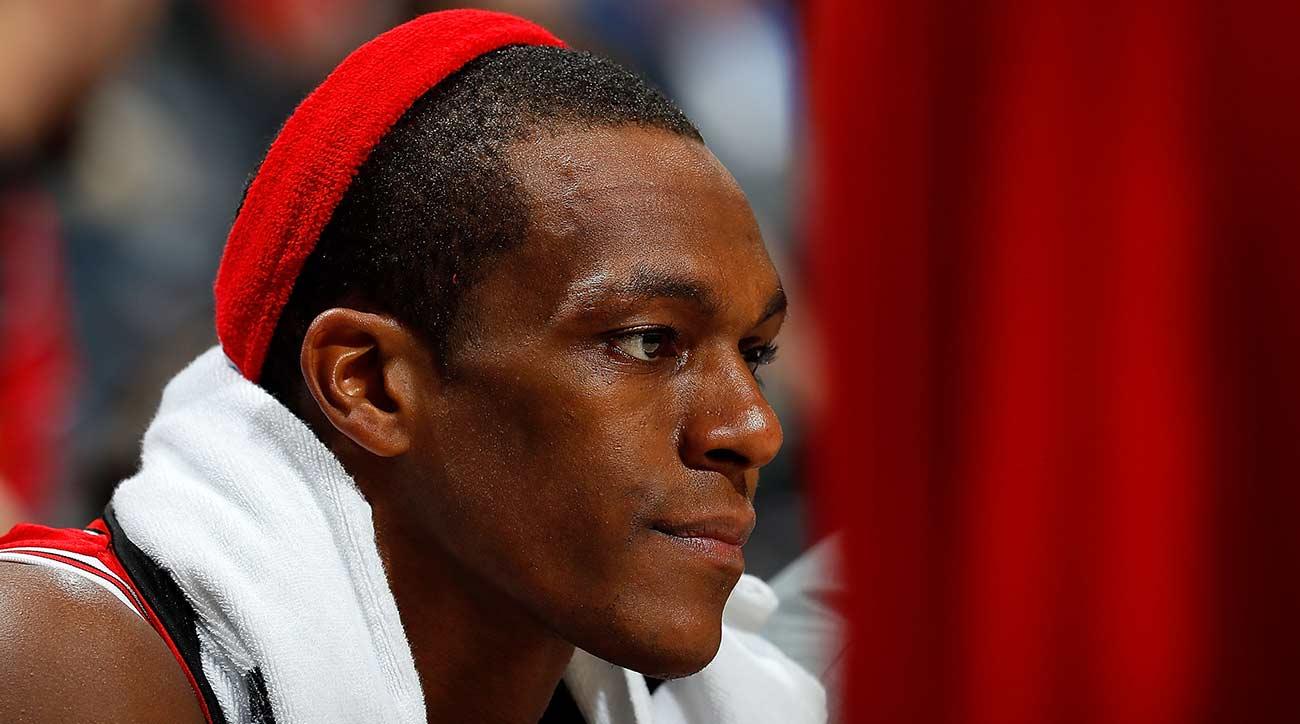 Rajon Rondo tries to sneak in a high-five with LeBron James