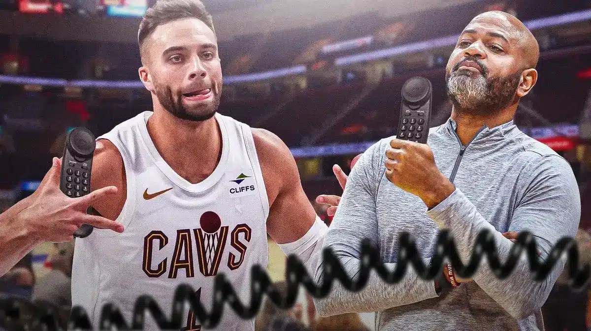 Cavs' JB Bickerstaff and Max Strus smiling while calling each other on a landline