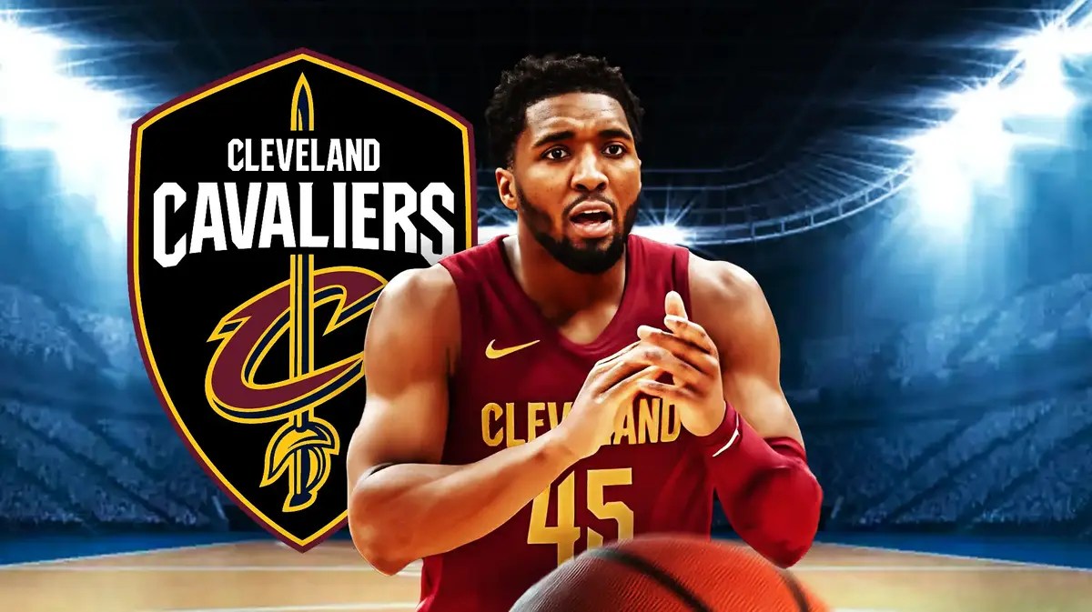 Cavs' Donovan Mitchell looks angry after Spurs big man Zach Collins' hard foul, Evan Mobley looks from out of frame