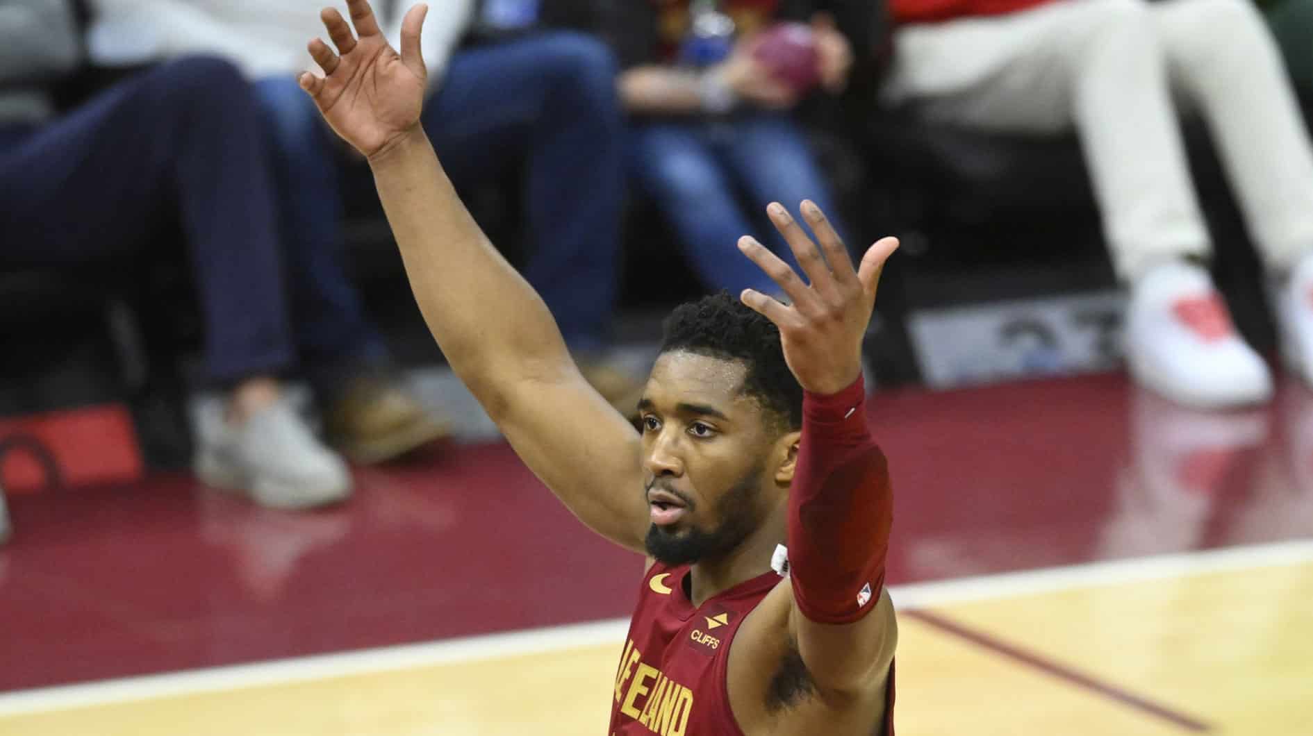 Apr 12, 2024; Cleveland, Ohio, USA; Cleveland Cavaliers guard Donovan Mitchell (45) reacts in the fourth quarter against the Indiana Pacers at Rocket Mortgage FieldHouse. Mandatory Credit: David Richard-USA TODAY Sports