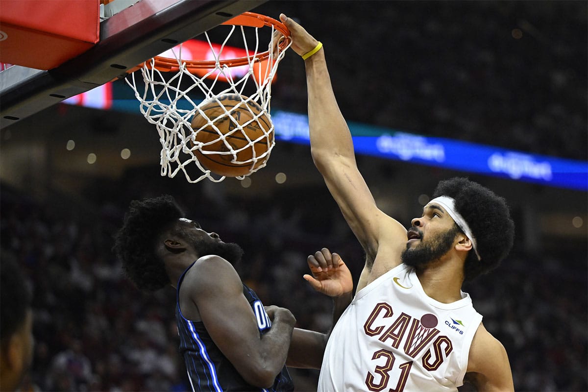 Cleveland Cavaliers center Jarrett Allen (31) dunks beside Orlando Magic forward Jonathan Isaac (1) in the second quarter during game one of the first round for the 2024 NBA playoffs at Rocket Mortgage FieldHouse. 