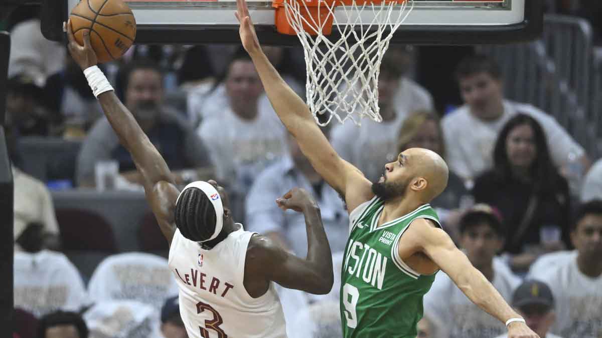May 13, 2024; Cleveland, Ohio, USA; Boston Celtics guard Derrick White (9) defends Cleveland Cavaliers guard Caris LeVert (3) in the first quarter of game four of the second round for the 2024 NBA playoffs at Rocket Mortgage FieldHouse. Mandatory Credit: David Richard-USA TODAY Sports