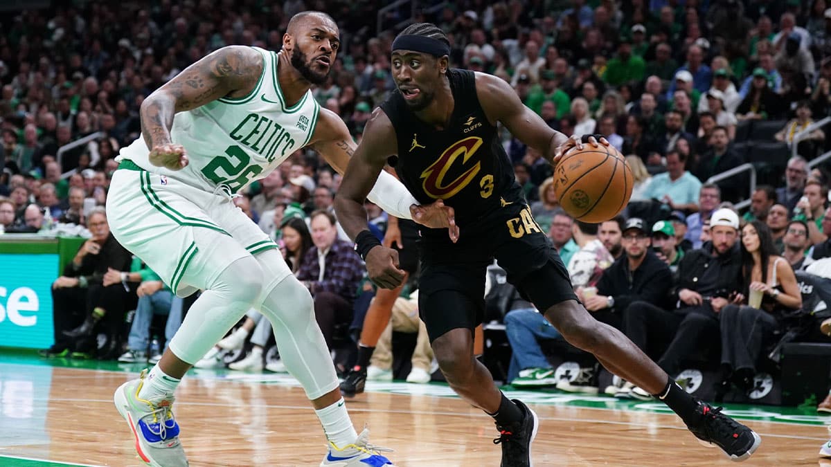 Cleveland Cavaliers guard Caris LeVert (3) drives the ball against Boston Celtics forward Xavier Tillman (26) in the second quarter during game two of the second round for the 2024 NBA playoffs at TD Garden