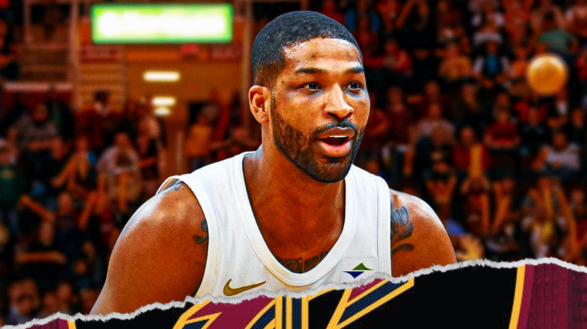 Cavs fans screaming around a picture of Tristan Thompson smiling in a Cavs uniform