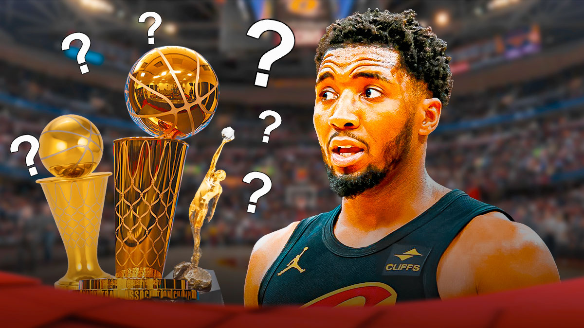 Cavs' Donovan Mitchell looking at Larry O'Brien trophy, NBA MVP trophy, and Finals MVP trophy, with question marks all over