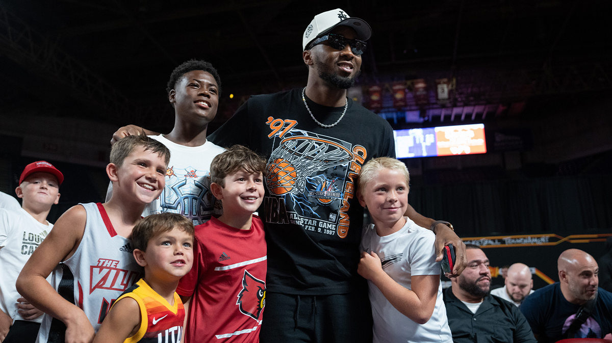 Donovan Mitchell takes a photo with fans during halftime of The Basketball Tournament’s second round between The Ville and Sideline Cancer on Monday, July 22, 2024 in Louisville, Ky. at Freedom Hall.