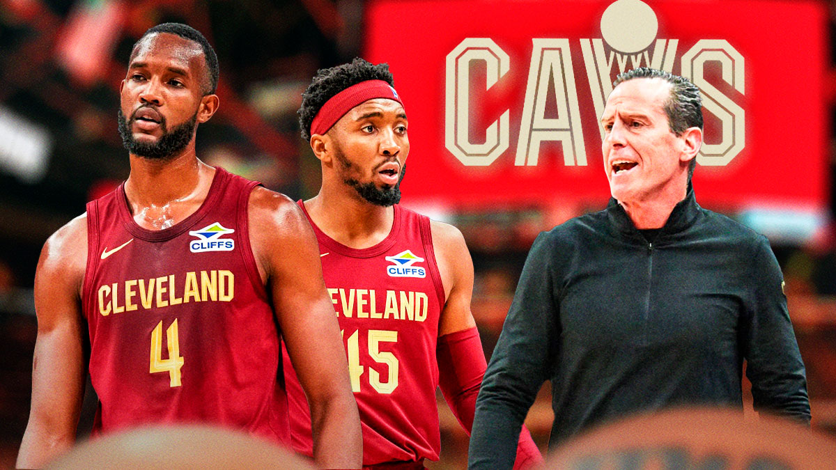 Cavs head coach Kenny Atkinson next to Cavs star Donovan Mitchell & Cavs forward Evan Mobley with the Cavs logo in the background