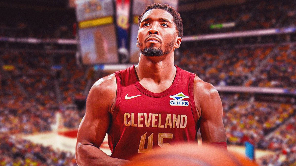 Cleveland Cavaliers player Donovan Mitchell with the Cavaliers arena in the background, Cavs career milestone