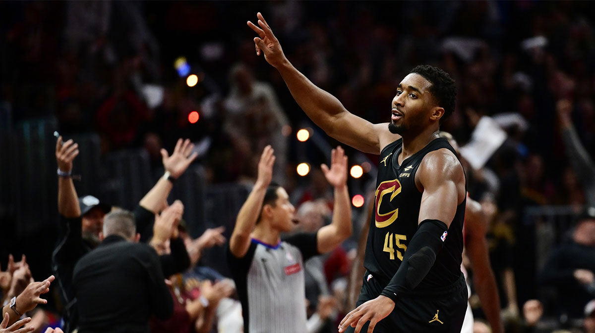 Cleveland Cavaliers guard Donovan Mitchell (45) celebrates after hitting a three point basket during the second half against the Chicago Bulls at Rocket Mortgage FieldHouse.