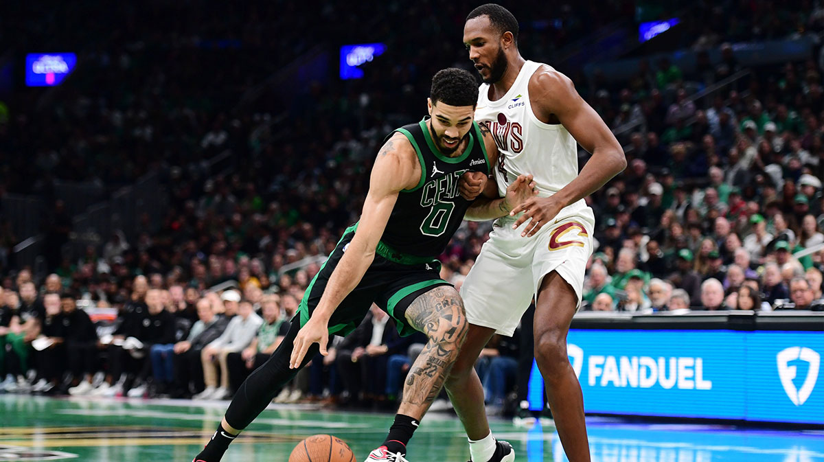 Boston Celtics forward Jayson Tatum (0) drives to the basket while Cleveland Cavaliers forward Evan Mobley (4) defends during the first half at TD Garden.