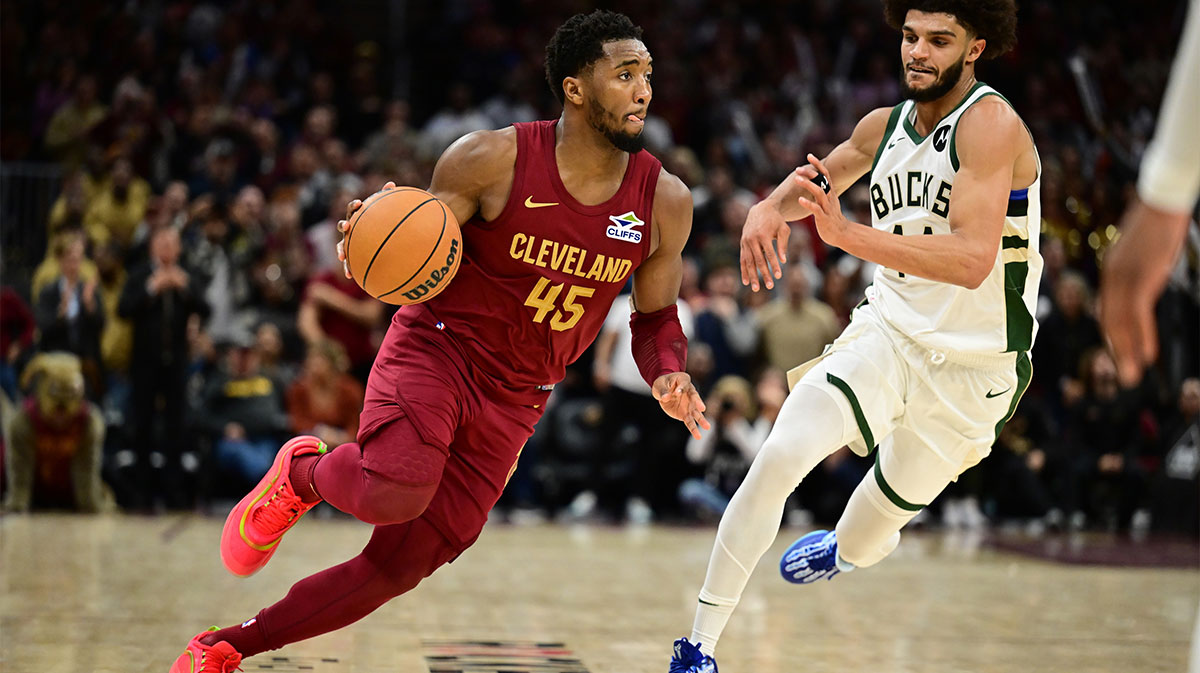 Cleveland Cavaliers guard Donovan Mitchell (45) drives to the basket against Milwaukee Bucks guard Andre Jackson Jr. (44) during the second half at Rocket Mortgage FieldHouse