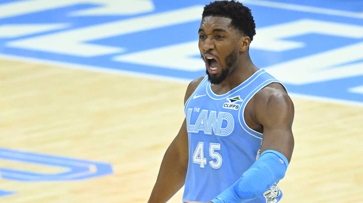 Cavaliers guard Donovan Mitchell (45) celebrates in the fourth quarter against the Utah Jazz at Rocket Mortgage FieldHouse