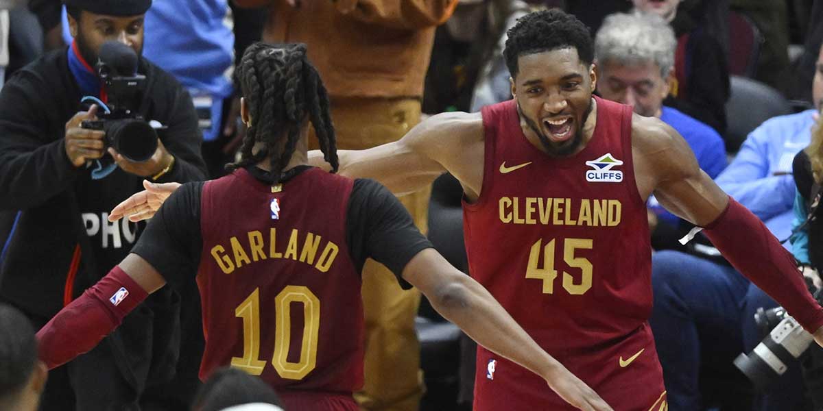 Cleveland Cavaliers guard Darius Garland (10) and guard Donovan Mitchell (45) celebrate a win over the Boston Celtics at Rocket Mortgage FieldHouse. 