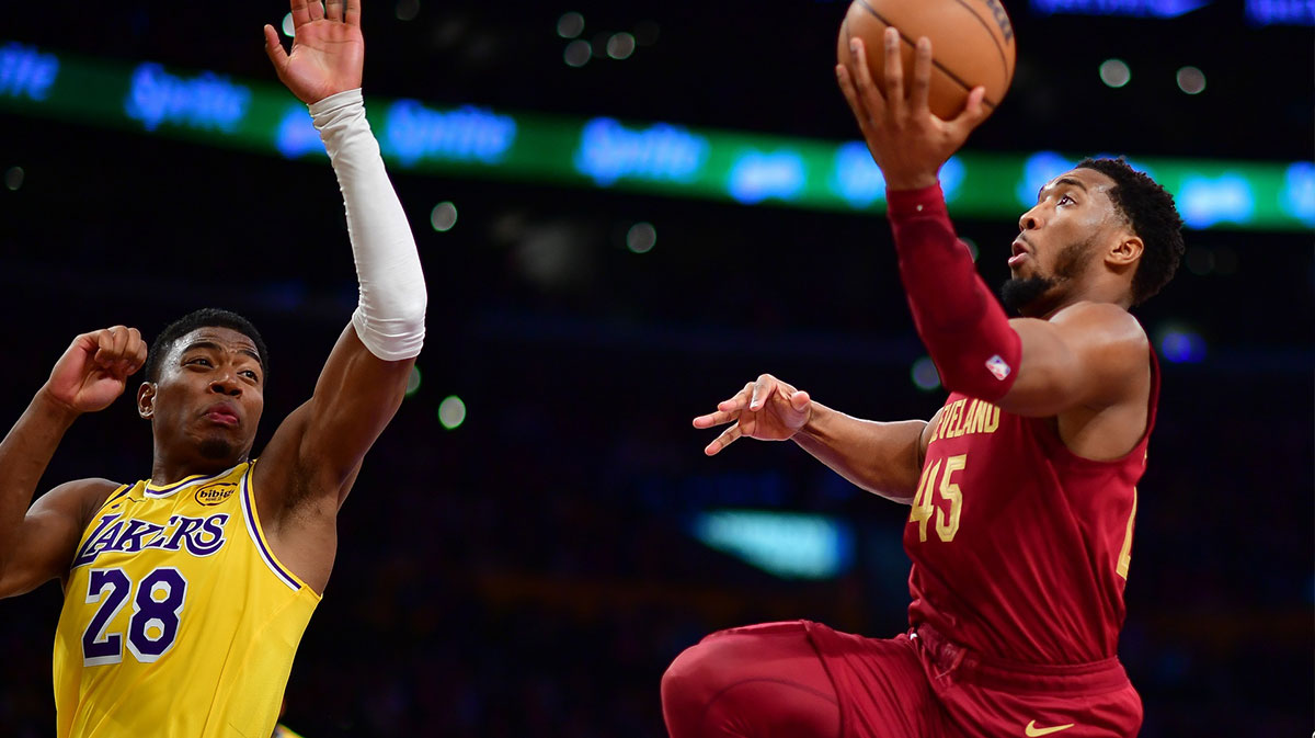 Cavaliers guard Donovan Mitchell (45) shoots agianst Los Angeles Lakers forward Rui Hachimura (28) during the second half at Crypto.com Arena