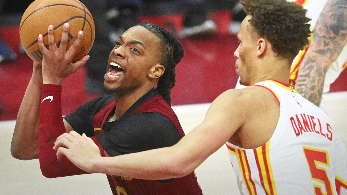 Cavaliers guard Darius Garland (10) drives against Atlanta Hawks guard Dyson Daniels (5) in the fourth quarter at Rocket Mortgage FieldHouse