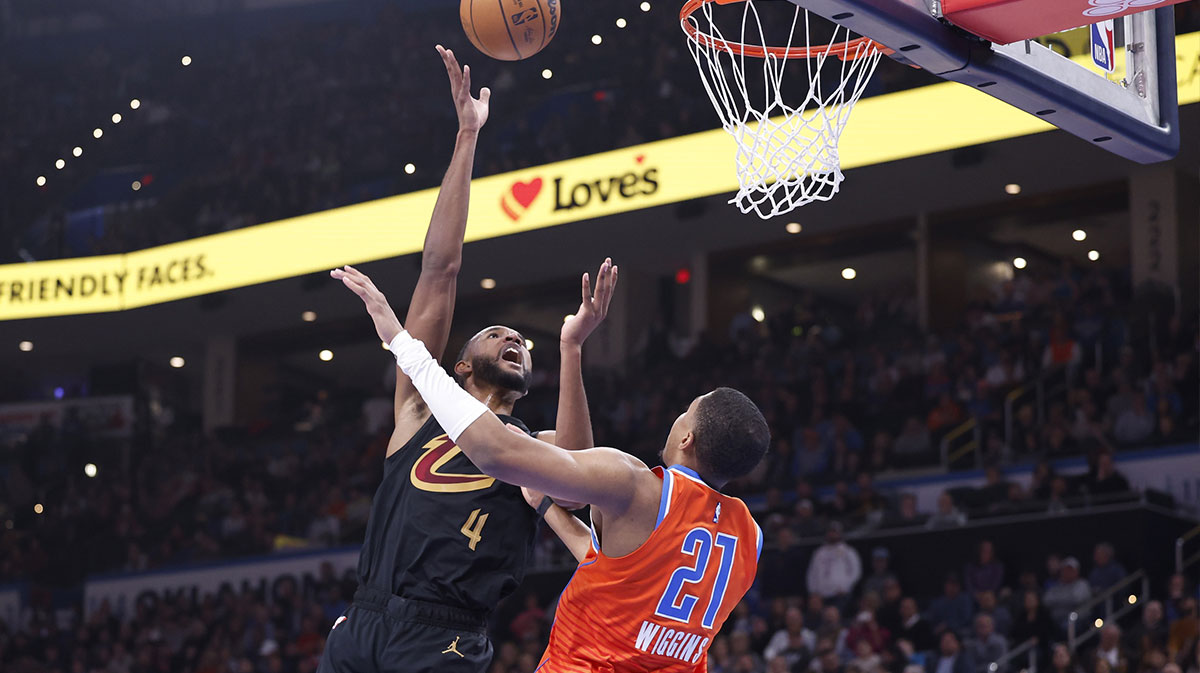 Cavaliers forward Evan Mobley (4) shoots over Oklahoma City Thunder guard Aaron Wiggins (21) during the second quarter at Paycom Center