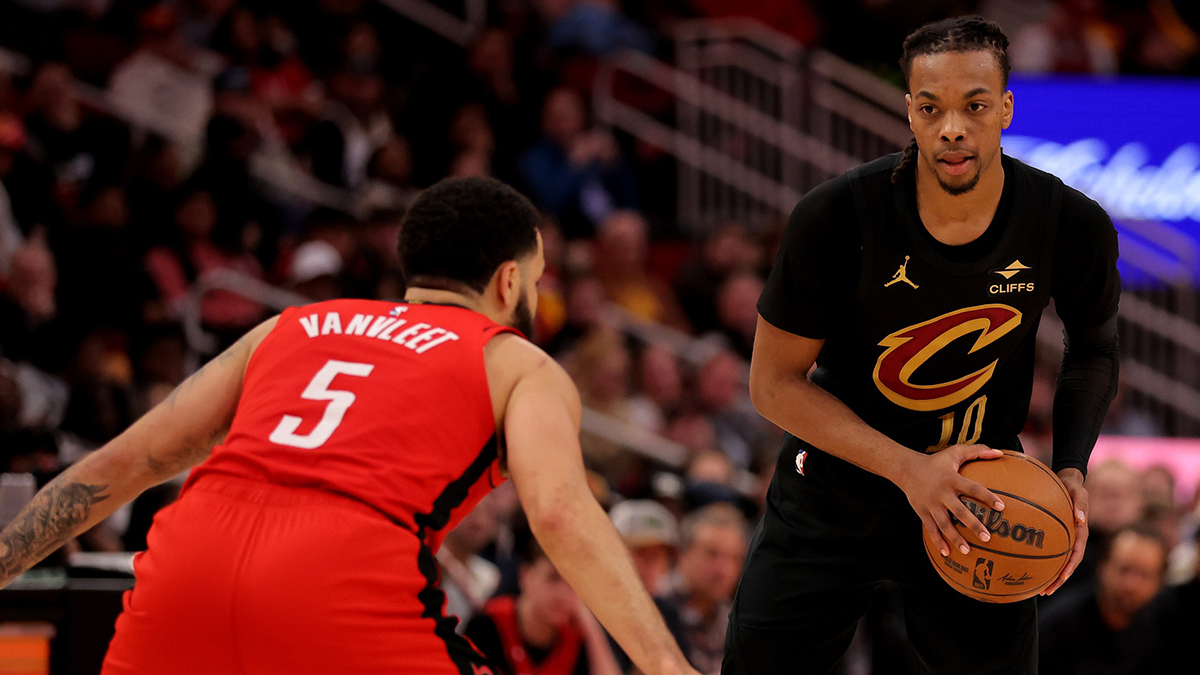 Cleveland Cavaliers guard Darius Garland (10) handles the ball against Houston Rockets guard Fred VanVleet (5) during the second quarter at Toyota Center.