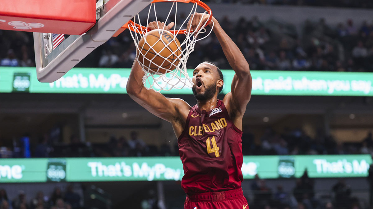 Cleveland Cavaliers forward Evan Mobley (4) dunks during the first half against the Dallas Mavericks at American Airlines Center. 