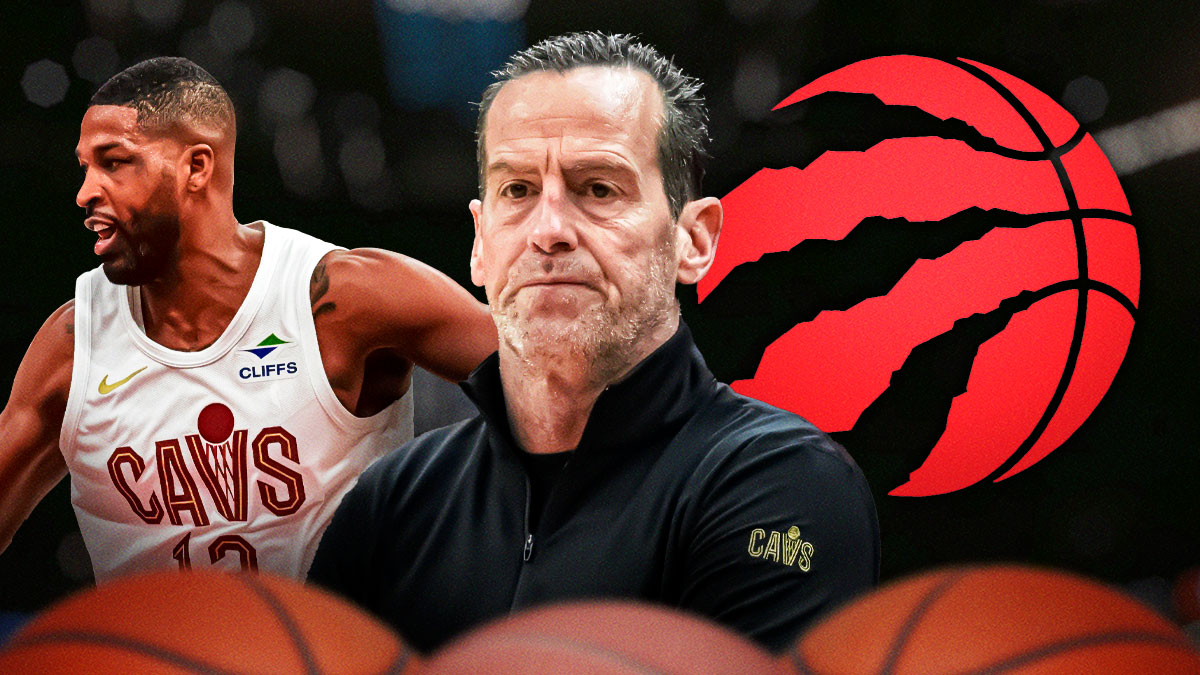 Cavs head coach Kenny Atkinson next to Cavs forward Tristan Thompson with the Cavs and Raptors logos in the background