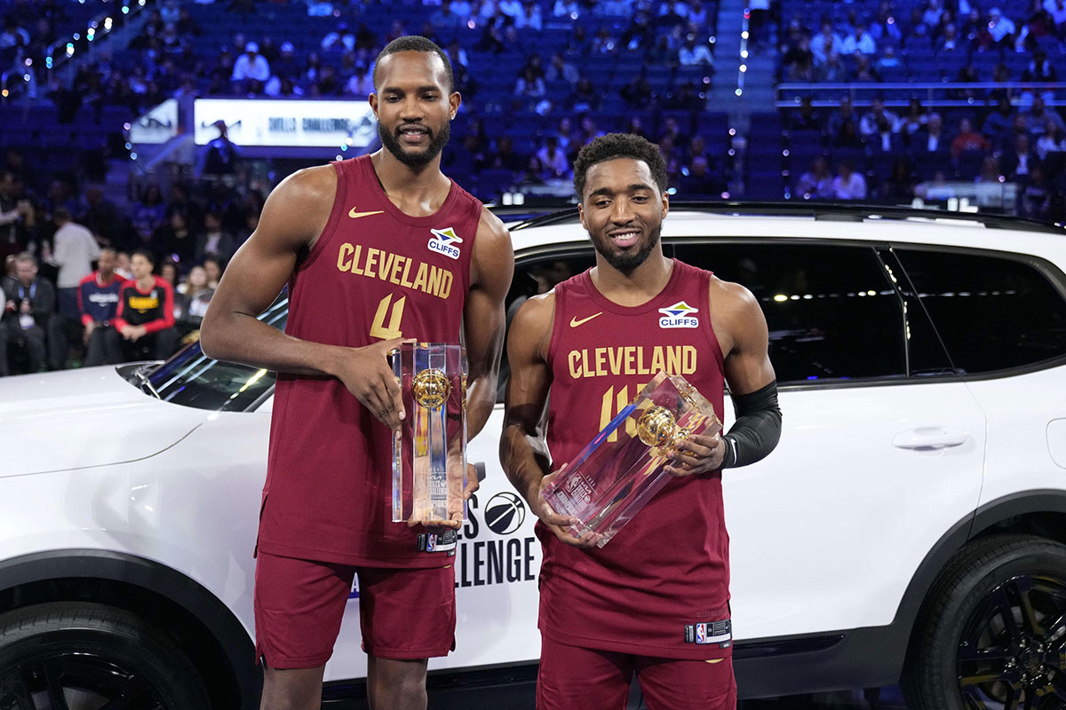 Team Cavs center Evan Mobley (4) and guard Donovan Mitchell (45) of the Cleveland Cavaliers celebrate with the trophies after winning the skills challenge during All Star Saturday Night ahead of the 2025 NBA All Star Game at Chase Center