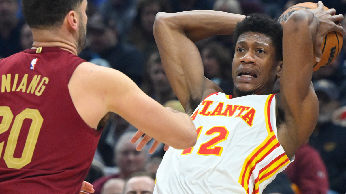 Cavaliers forward Georges Niang (20) defends Atlanta Hawks forward De'Andre Hunter (12) in the first quarter at Rocket Mortgage FieldHouse