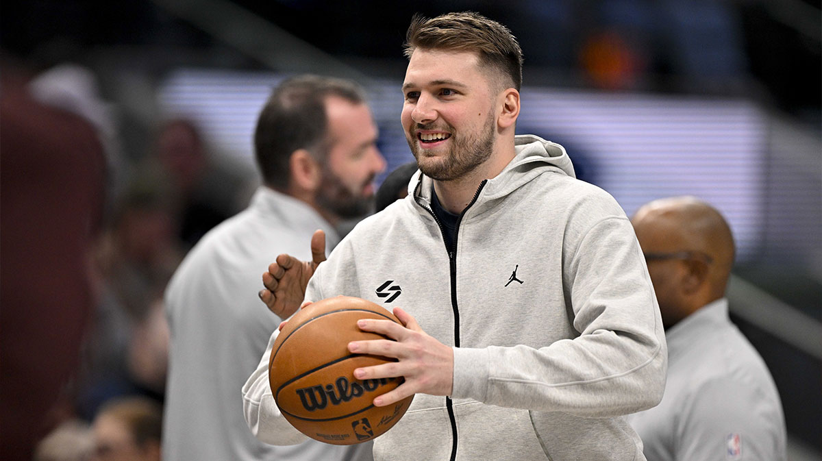 Dallas Mavericks guard Luka Doncic (77) looks on during a stoppage in play during the first half of the game between the Dallas Mavericks and the Minnesota Timberwolves at the American Airlines Center.