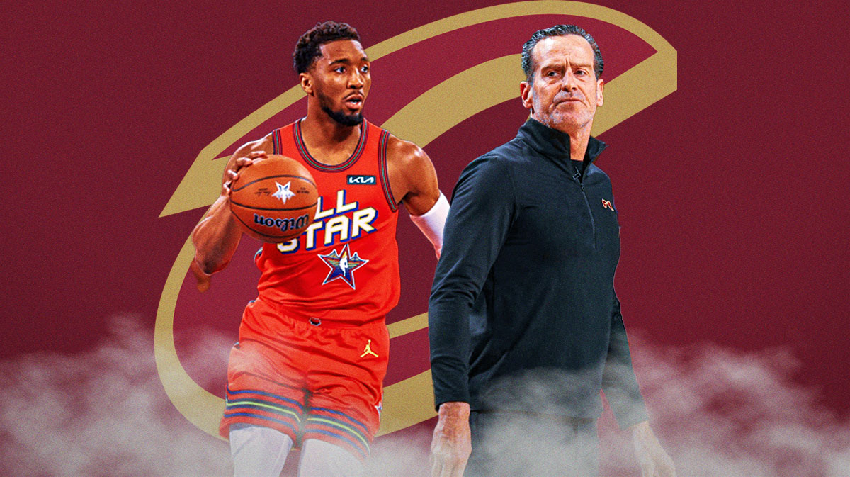 Cavs All-Star Donovan Mitchell next to Cavs head coach Kenny Atkinson with the Cavs logo in the background on 16-game winning streak days before this year's Super Bowl