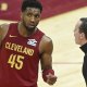 Cavaliers guard Donovan Mitchell (45) talks to head coach Kenny Atkinson in the fourth quarter against the Houston Rockets at Rocket Mortgage FieldHouse