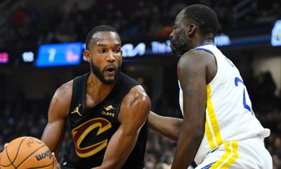 Cavs All-Star Evan Mobley next to Warriors veteran Draymond Green