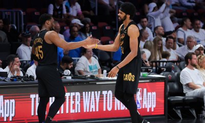 Cleveland Cavaliers center Jarrett Allen (31) high-fives guard Donovan Mitchell (45) in the fourth quarter against the Miami Heat during game three for the first round of the 2025 NBA Playoffs at Kaseya Center.