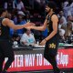 Cleveland Cavaliers center Jarrett Allen (31) high-fives guard Donovan Mitchell (45) in the fourth quarter against the Miami Heat during game three for the first round of the 2025 NBA Playoffs at Kaseya Center.