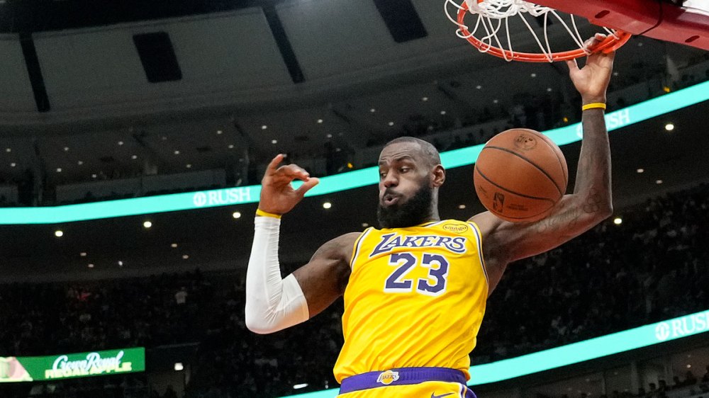 Los Angeles Lakers forward LeBron James (23) dunks against the Chicago Bulls during the second half at United Center.