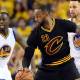 Cleveland Cavaliers forward LeBron James (23) handles the ball against Golden State Warriors guard Stephen Curry (30) during the third quarter in game seven of the NBA Finals at Oracle Arena.