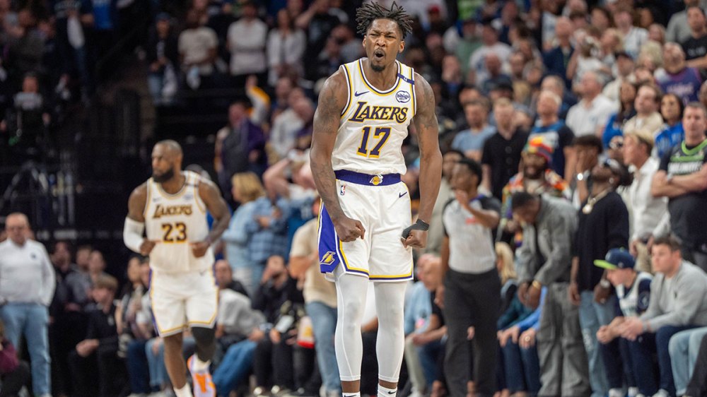 Los Angeles Lakers forward Dorian Finney-Smith (17) celebrates after scoring a three pointer agains the Minnesota Timberwolves in the fourth quarter during game four of first round for the 2025 NBA Playoffs at Target Center.