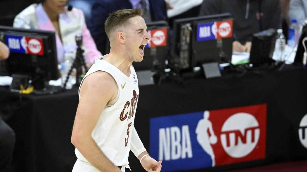 Cleveland Cavaliers guard Sam Merrill (5) celebrates his three-point basket in the fourth quarter against the Miami Heat at Rocket Arena.
