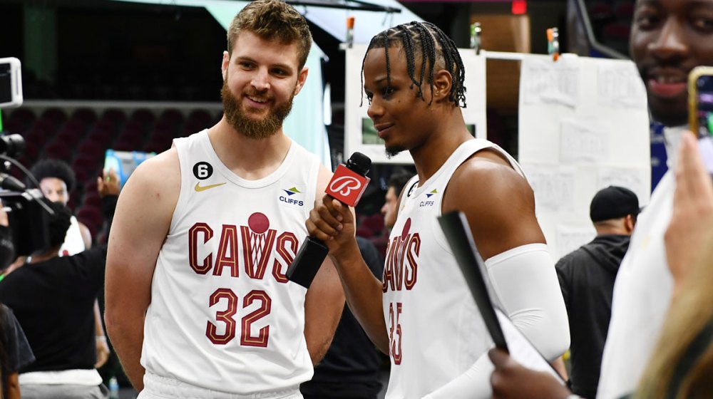 Cleveland Cavaliers forward Isaac Okoro (35) interviews forward Dean Wade (32) during media day at Rocket Mortgage FieldHouse.