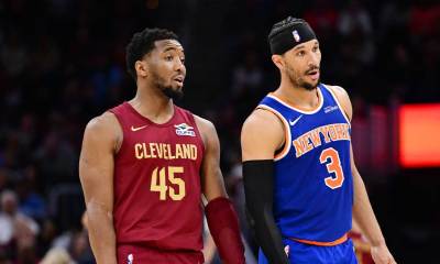 Cleveland Cavaliers guard Donovan Mitchell (45) talks to New York Knicks guard Josh Hart (3) during the second half at Rocket Arena. ndatory Credit: