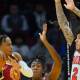 Chicago Bulls guard Ayo Dosunmu (12) and guard Lonzo Ball (2) defend Cleveland Cavaliers forward Isaac Okoro (35) in the third quarter at Rocket Mortgage FieldHouse.
