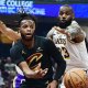Cleveland Cavaliers guard Darius Garland (10) passes as Los Angeles Lakers forward LeBron James (23) defends during the first half at Rocket Mortgage FieldHouse.