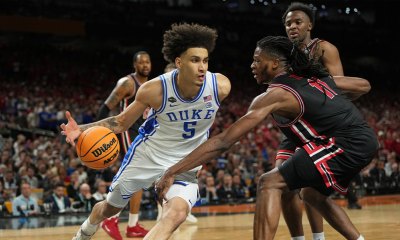 Duke Blue Devils guard Tyrese Proctor (5) drives to the basket against Houston Cougars forward Joseph Tugler (11) during the second half in the semifinals of the men's Final Four of the 2025 NCAA Tournament at the Alamodome.