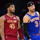 Cleveland Cavaliers guard Donovan Mitchell (45) talks to New York Knicks guard Josh Hart (3) during the second half at Rocket Arena.