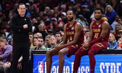Cleveland Cavaliers forward Evan Mobley (4) and guard Donovan Mitchell (45) wait along side head coach Kenny Atkinson to enter the game during the first half against the New York Knicks at Rocket Arena.