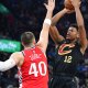 Cavaliers forward De’Andre Hunter (12) shoots against Los Angeles Clippers center Ivica Zubac (40) during the first half at Intuit Dome