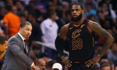 Cavs head coach Tyronn Lue (center) talks with guard George Hill (3) and forward LeBron James (23) against the Phoenix Suns at Talking Stick Resort Arena