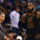 Cavs head coach Tyronn Lue (center) talks with guard George Hill (3) and forward LeBron James (23) against the Phoenix Suns at Talking Stick Resort Arena