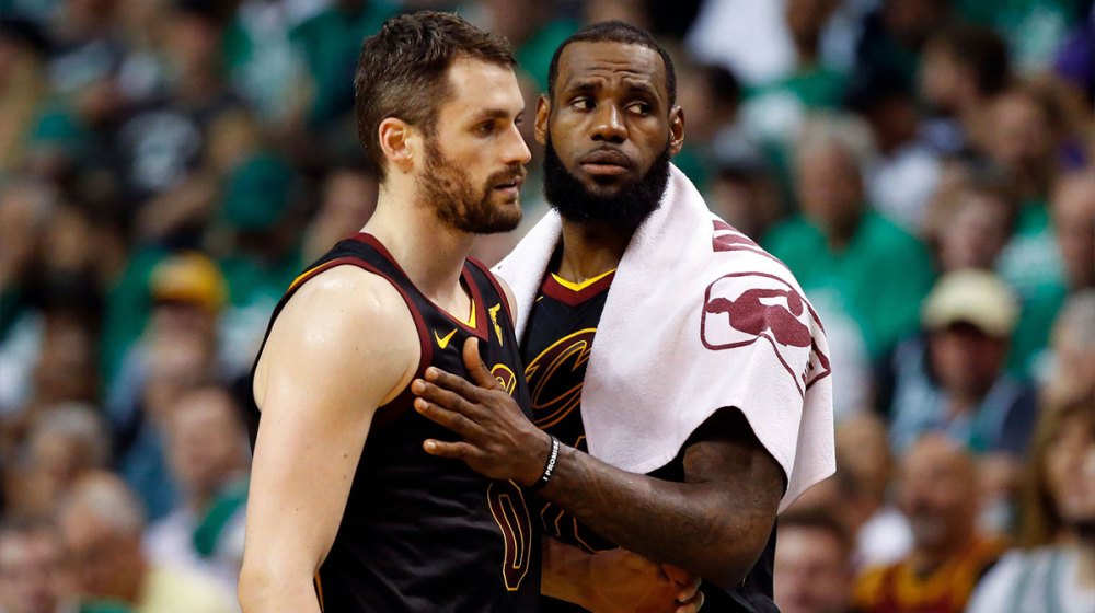Cleveland Cavaliers center Kevin Love (0) and forward LeBron James (23) talk during the second quarter of game five against the Boston Celtics in the Eastern conference finals of the 2018 NBA Playoffs at TD Garden.