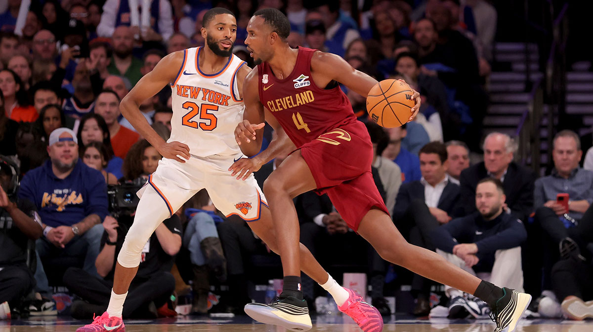 Cavaliers center Evan Mobley (4) controls the ball against New York Knicks guard Mikal Bridges (25) during the fourth quarter at Madison Square Garden